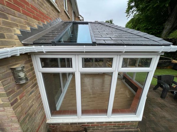 New solid and glass panel roof